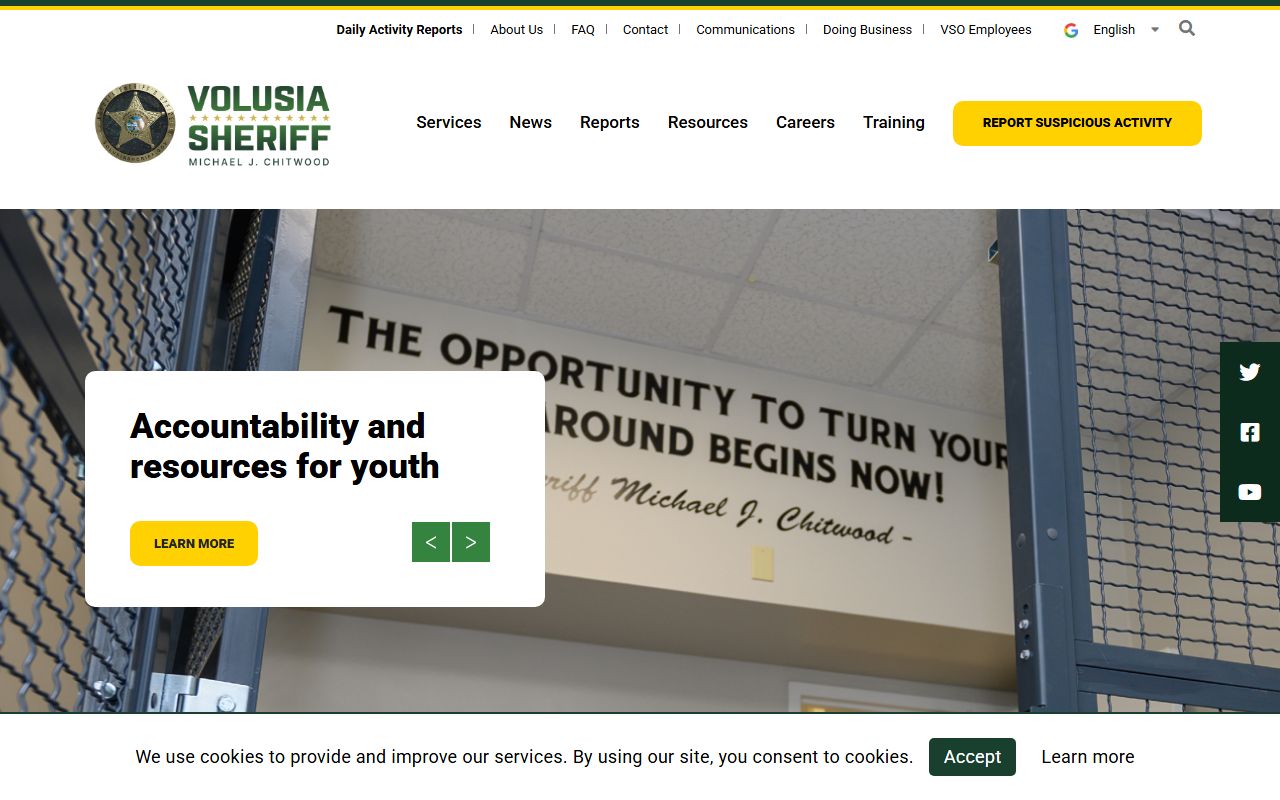 Volusia County Sheriff's Office homepage with navigation to corrections and inmate search